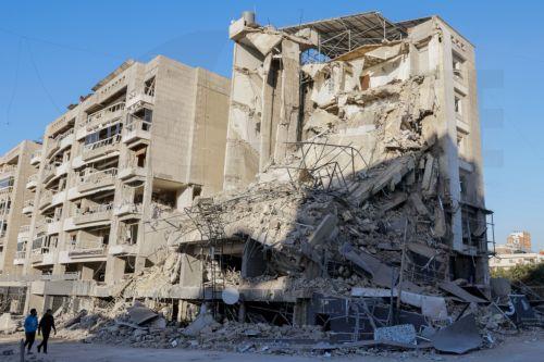 epa12807375 The destroyed branch of the Al-Qard Al-Hasan, a Hezbollah-affiliated financial institution, after it was targeted by an Israeli strike in the southern suburbs of Beirut, Lebanon, 09 March 2026. The Israeli military stated it is conducting strikes across the country targeting Hezbollah infrastructure and personnel. According to the Lebanese...
