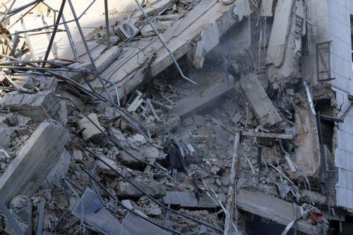 epa12807381 The destroyed branch of the Al-Qard Al-Hasan, a Hezbollah-affiliated financial institution, after it was targeted by an Israeli strike in the southern suburbs of Beirut, Lebanon, 09 March 2026. The Israeli military stated it is conducting strikes across the country targeting Hezbollah infrastructure and personnel. According to the Lebanese...