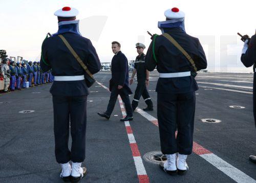 epa12807433 French President Emmanuel Macron (C-L) visits the French aircraft carrier Charles de Gaulle in the eastern Mediterranean, on the sidelines of his visit to Cyprus, 09 March 2026. The Charles de Gaulle was recently deployed in the Eastern Mediterranean, near Cyprus due to escalating conflict in the Middle East.  EPA/GONZALO FUENTES / POOL  MAXPPP...