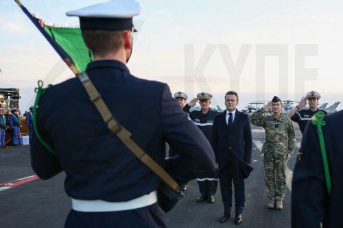 epa12807437 French President Emmanuel Macron (3-R) visits the French aircraft carrier Charles de Gaulle in the eastern Mediterranean, on the sidelines of his visit to Cyprus, 09 March 2026. The Charles de Gaulle was recently deployed in the Eastern Mediterranean, near Cyprus due to escalating conflict in the Middle East.  EPA/GONZALO FUENTES / POOL  MAXPPP...