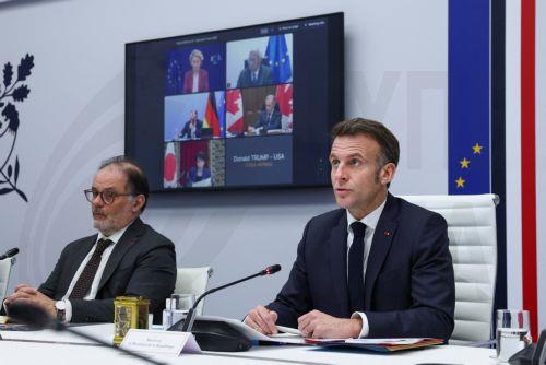 epa12811761 French President Emmanuel Macron (R) chairs a video conference of G7 leaders, next to the Secretary General to the President of France, Emmanuel Moulin (L) to discuss the fallout of the war in Iran on the world economy, amid the U.S.-Israeli conflict with Iran, at the Elysee Palace in Paris, France, 11 March 2026.  EPA/Gonzalo Fuentes / POOL...