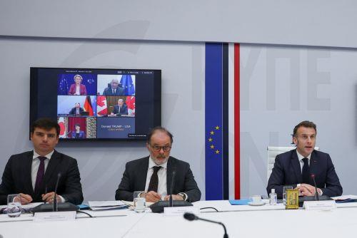 epa12811764 French President Emmanuel Macron (R) chairs a video conference of G7 leaders, next to Head Economic adviser, Matthieu Landon (L) and Secretary General to the President of France, Emmanuel Moulin (C), to discuss the fallout of the war in Iran on the world economy, amid the U.S.-Israeli conflict with Iran, at the Elysee Palace in Paris, France, 11...