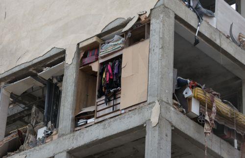 epa12813977 A view of the closet shelves inside a damaged residential building in central Tehran, Iran, 12 March 2026. A joint Israeli and US military operation continues to target multiple locations across Iran since the early hours of 28 February 2026.  EPA/ABEDIN TAHERKENAREH