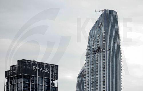 epa12814068 A view of the damaged part of the Dubai Creek Harbour Tower after it was hit by an Iranian drone attack in Dubai, United Arab Emirates, 12 March 2026.  EPA/STRINGER