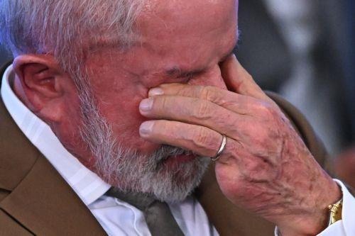 epa12815417 Brazilian President Luiz Inacio Lula da Silva reacts during an event at the Planalto Palace in Brasilia, Brazil, 12 March 2026. The Brazilian government announced a series of fiscal measures to mitigate the domestic impact on consumers of the rise in international oil prices caused by the war in the Middle East.  EPA/Andre Borges