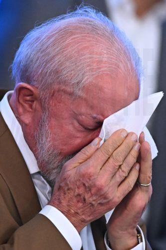 epa12815418 Brazilian President Luiz Inacio Lula da Silva reacts during an event at the Planalto Palace in Brasilia, Brazil, 12 March 2026. The Brazilian government announced a series of fiscal measures to mitigate the domestic impact on consumers of the rise in international oil prices caused by the war in the Middle East.  EPA/Andre Borges