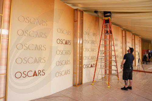 epa12815915 Workers assemble parts of the red carpet as preparations for the 98th annual Academy Awards ceremony get underway in Los Angeles, California, USA, 12 March 2026. The 98th Academy Awards ceremony will take place at the Dolby Theatre in Los Angeles on 15 March 2026.  EPA/CHRIS TORRES