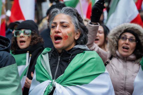 epa12823488 Women shouts slogans during a ‘Freedom for Iran’ protest in New York, New York, USA, 15 March 2026. The rally comes amid ongoing hostilities involving the United States, Israel and Iran.  EPA/OLGA FEDOROVA