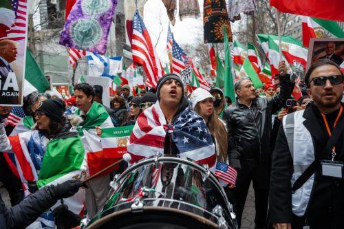 epa12823489 People chant during a ‘Freedom for Iran’ protest in New York, New York, USA, 15 March 2026. The rally comes amid ongoing hostilities involving the United States, Israel and Iran.  EPA/OLGA FEDOROVA