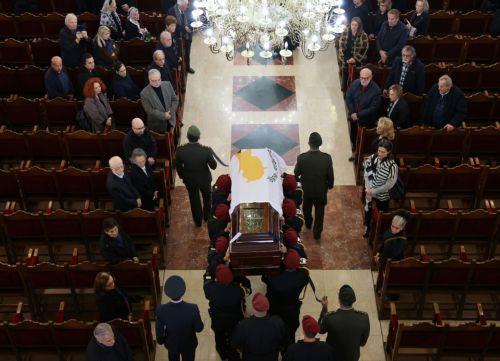 Casket carrying deceased former President Vassiliou arrives at church for state funeral